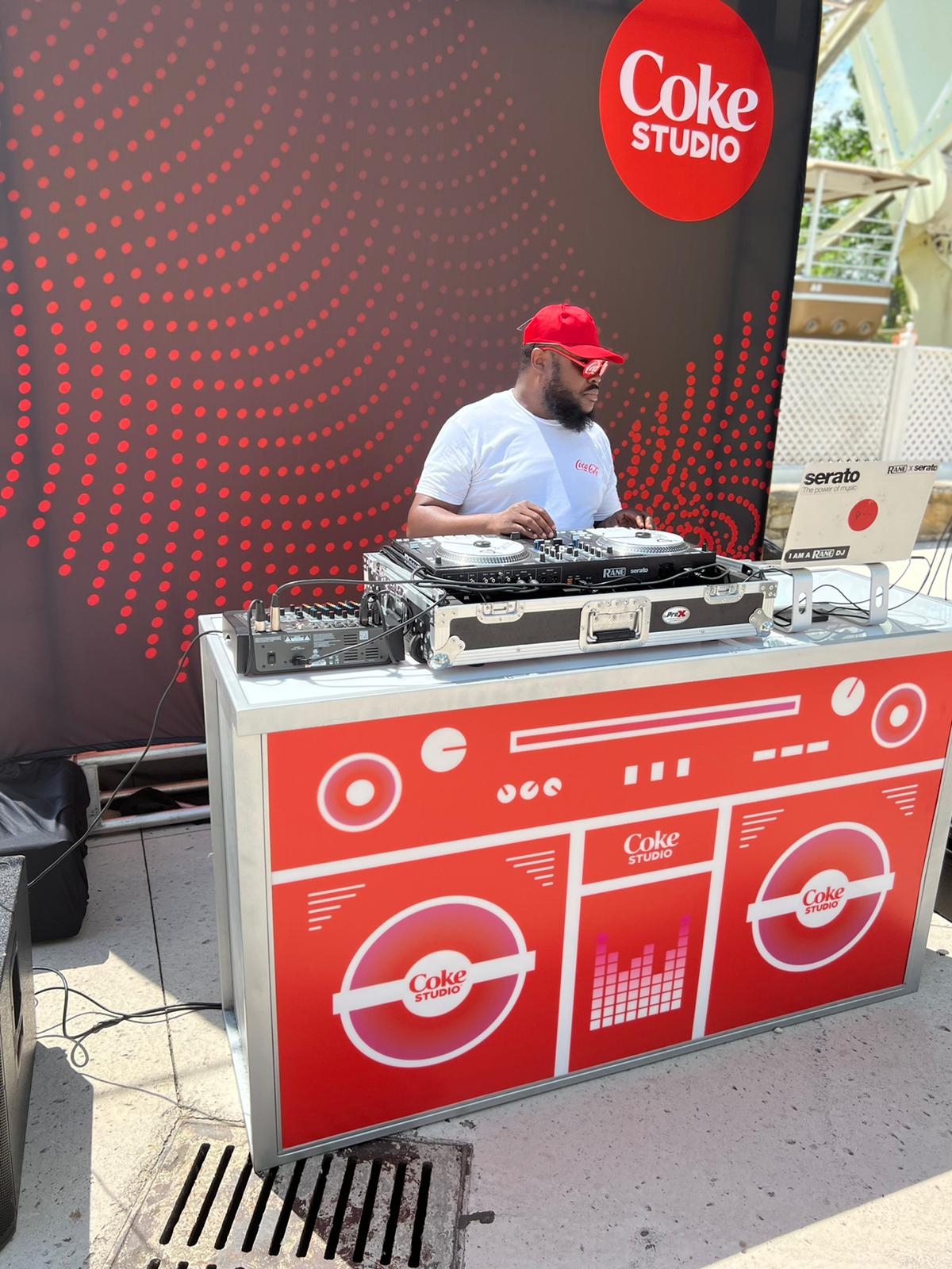 Professional DJ setup at a Coca-Cola corporate event