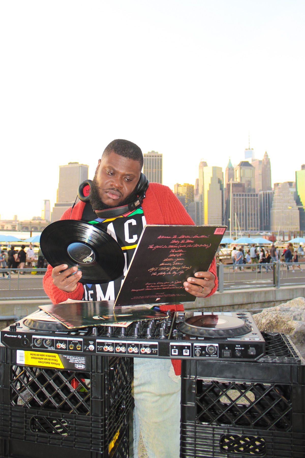 SpinLab founder Mackie Charles selecting records at his DJ setup